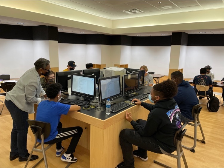 students work on computers