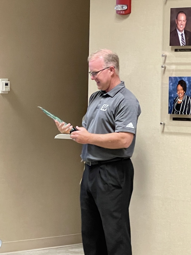 David Holt accepts a 'Warrior for Life' award for his contributions to Warren Township